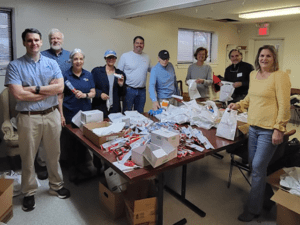 Orange Rotarians spreading smiles and holiday cheer